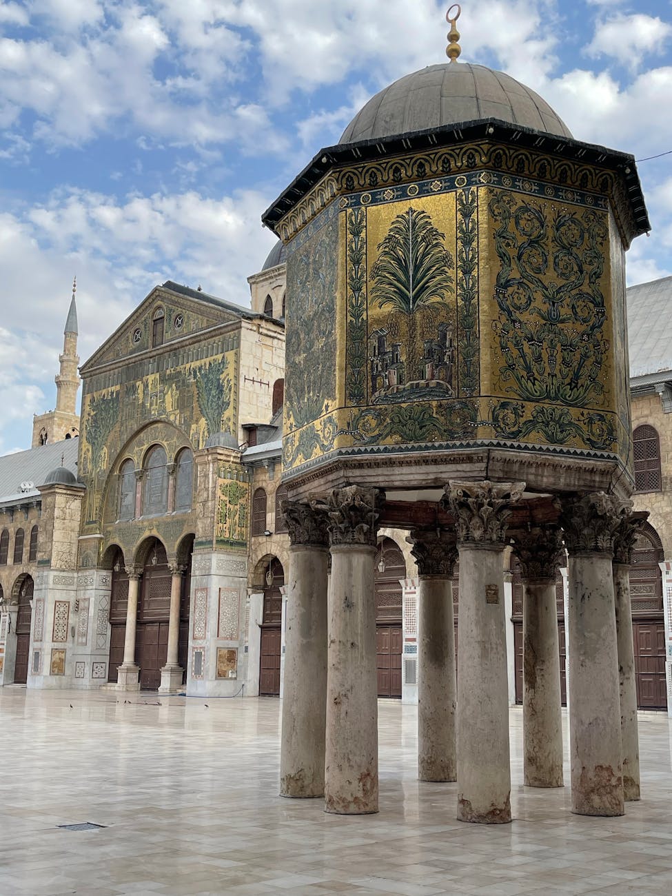 golden ornamental architecture with pillars on a courtyard